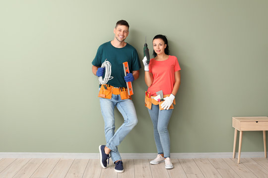 Happy Couple During Repair In Their New House