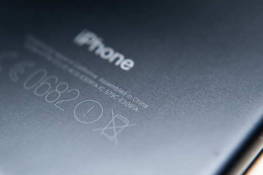 Bangkok, Thailand - July 30, 2019 : The text "Assembled in China" engraved on the back of iPhone 7.