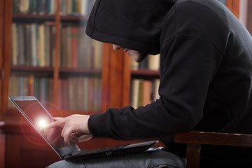 Hacker in action, cybercrime