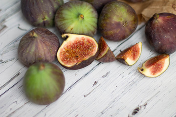  figs on a dark background, paleo diet, still life