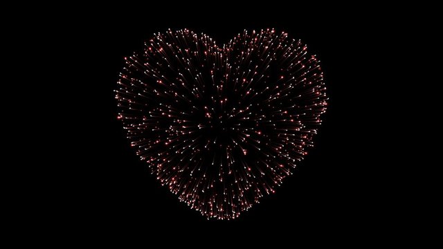 Heart shape fireworks. The lights are shining and flying away.