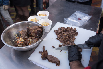 Chef cooks sheep meat
