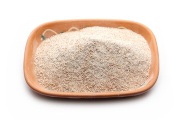 Integral rye wheat flour in clay pot, bowl isolated on white background