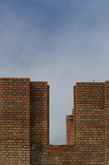 Brick wall building, brick walls construction, blue sky