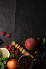 bowl with tobacco for hookah. berries on a black background