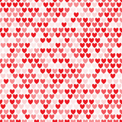 Seamless pattern with red hearts