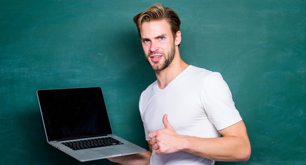 online video training. student man at e learning class. college teacher use laptop technology....