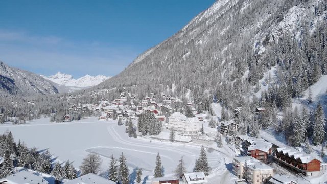 4K Winter season lovely ski resort in the mountain. Scenic landscape on a sunny day with fresh snow