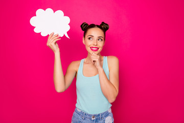 Portrait of charming person holding paper card bubble having thoughts touching her chin isolated over fuchsia background