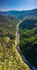 Aerial view of a river in a mountain canyon 