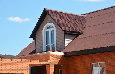 House renovation with building new room. Attic house roofing construction