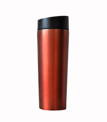 Metal red tight thermo cup to go on a white background isolate keeps drinks: tea, coffee hot. Сoncept of rejection of plastic disposable tableware to save the earth. Using stainless thermos eco trend.