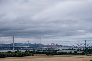 Forth bridges and Queensferry bridge crossing the River Forth in Scotland, UK