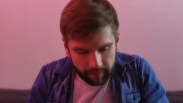 Addicted male holding drug syringe, altered state of consciousness health danger