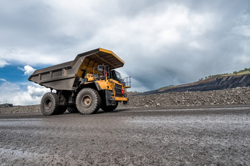 Obraz premium Large quarry dump truck. Transport industry.