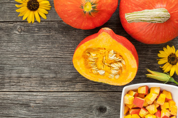 Hokkaido pumpkin on a wooden table