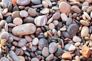 Gray sea pebbles of the Mediterranean Sea. Turkey. Top view, close-up.