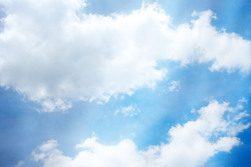 White Cloud with Blue Sky and Soft Light Leak Background.