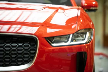 Foto op Canvas luxury red sports electric car © mtz82