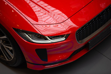 luxury red sports electric car - obrazy, fototapety, plakaty