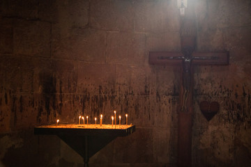 The old Church in the twilight of a Christian cross.