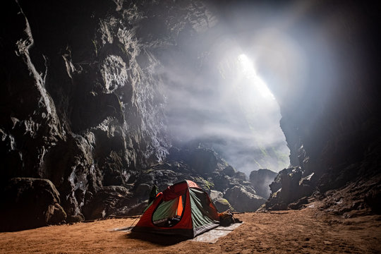 Caver's tent in the mist at first doline camp in Son Doong cave, Vietnam