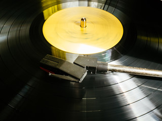 A vinyl record plays music. Atmospheric sound of classical music