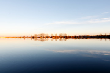 landscape in a lake at sunset