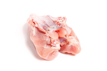 Raw fillet of chiken breast on a light background