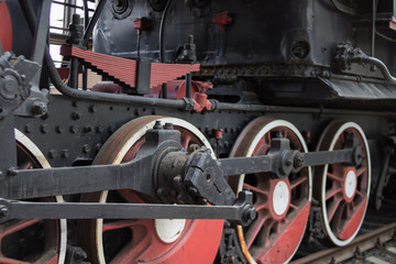 Locomotive, wheel drive mechanism. Detail. Close-up.