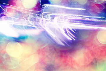 traces of headlights glow / blurred background nocturnal traces of light, texture of a night city