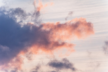 sunset background. sky with soft and blur pastel colored clouds. sunshine through the gradient cloud on the beach resort. nature. sunrise.  peaceful morning