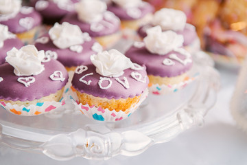 Sweet bar at the wedding. Cake Muffins and Sweets
