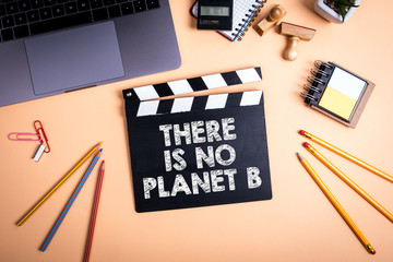 There is no planet B reminder and warning. Movie clapper on the table