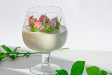Сandle making - Handmade soy wax candle in glass on white background. Front view. Healthy lifestyle concept