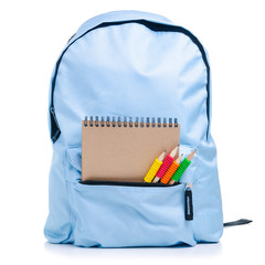 Blue backpack with school supplies on white background isolation