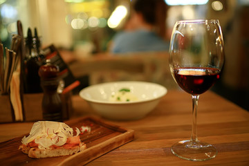 wine restaurant serving romance / beautiful concept alcohol glass, holiday dinner in a cafe