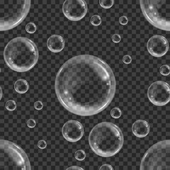 Seamless pattern with realistic floating soap bubbles on transparent background. Design element for advertising booklet, flyer or poster