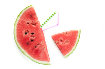 Slices of juicy ripe red watermelon on a white background. Fresh watermelon juice. Cocktails and soft drinks with watermelon.