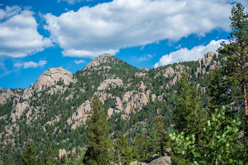 Rocky Mountain National Park low angle landscape of stone mountains and trees on Lumpy Ridge trail