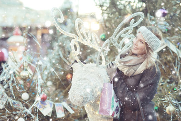 happy girl with snowflakes Christmas winter portrait