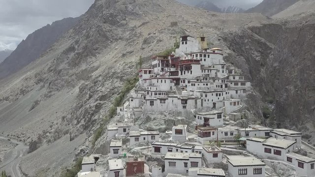 Aerial view of Diskit Monastery, the oldest and largest Buddhist monastery (gompa) in the Nubra Valley of Ladakh, northern India. Drone flying backwards.