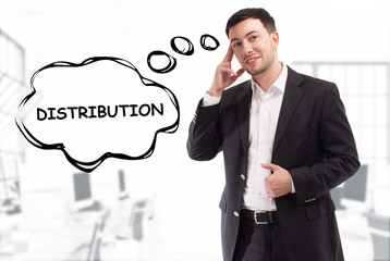 Business, technology, internet and network concept. The young businessman comes up with the keyword: Distribution