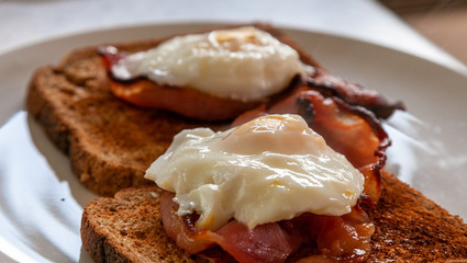 Bacon and eggs on toast