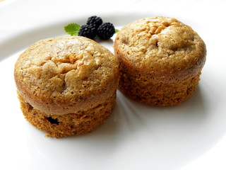 cupcake with berries on a white background