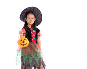 Asian little girl in costume of witch isolated on white background. Happy halloween concept.