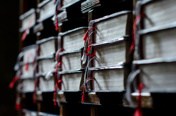 Close-up of Bibles In Book Shelf