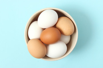 chicken eggs on a colored background. Farm products, natural eggs.