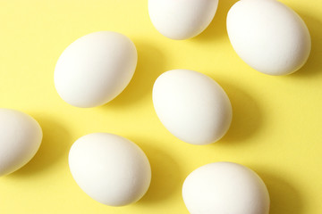 chicken eggs on a colored background. Farm products, natural eggs.