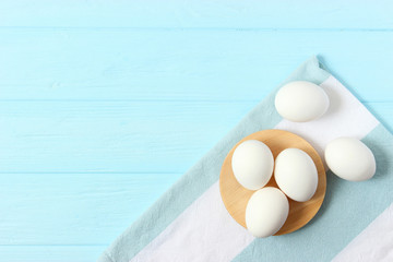 chicken eggs on a colored background. Farm products, natural eggs.